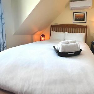 Queen Bed Shared Bath